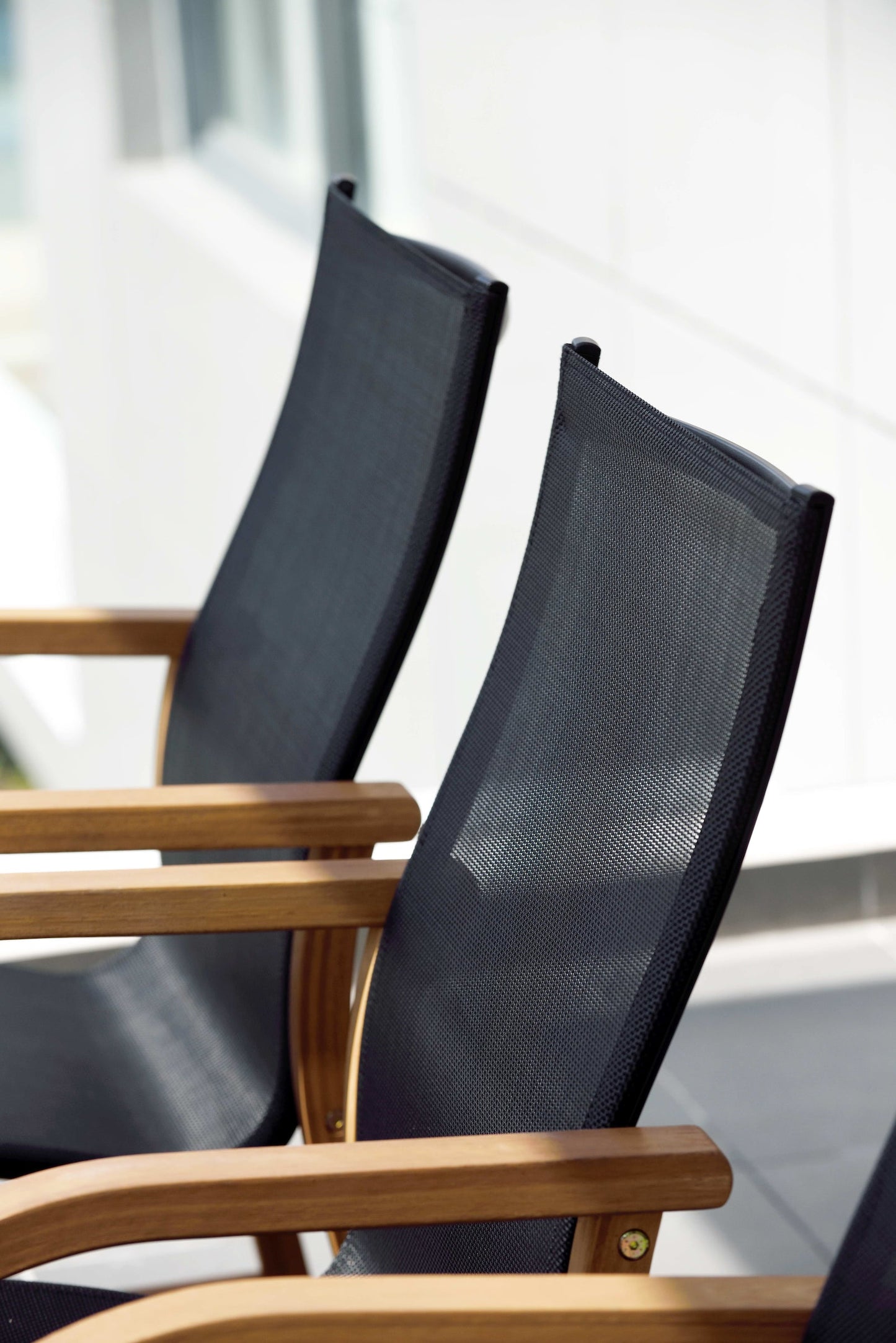 The Manhattan & Orlando Dining Collection: Hand-Finished Wood Table with Sophisticated Black Seating