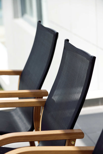 The Manhattan & Orlando Dining Collection: Hand-Finished Wood Table with Sophisticated Black Seating